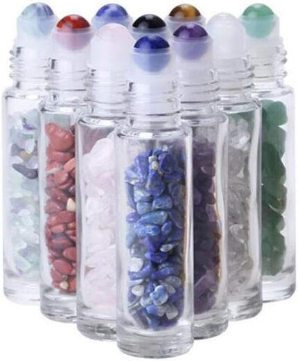Create personalized essential oil blends with these 10ml glass roller bottles, featuring natural gemstone roller balls and chips inside for an added touch of elegance.